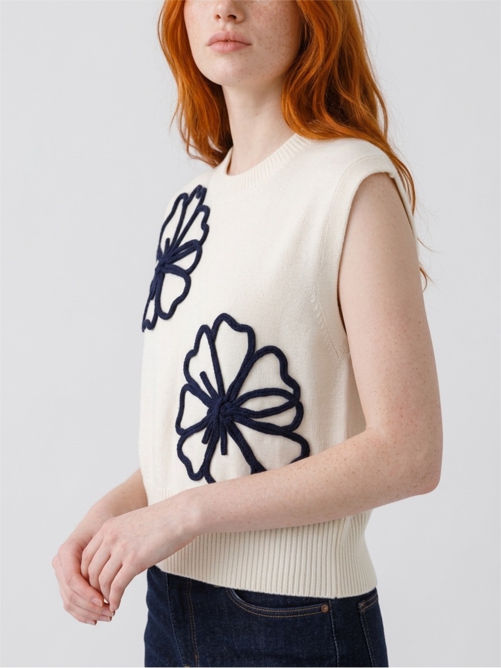 Commense White Knit Sleeveless Top with Navy Floral Outline Appliqués